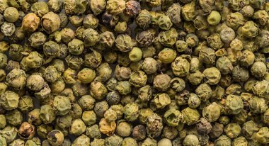 arka plan doku olarak yeşil biber tohumları. Organik gıda, sağlıklı yaşam, metin için yer. Üstten Görünüm, düz lay