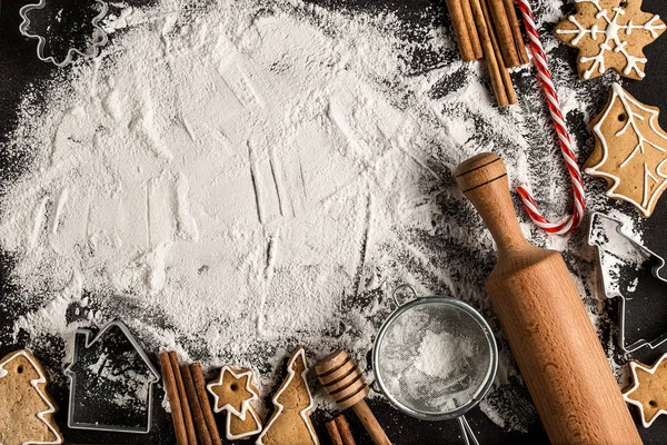 Christmas food. Ingredients for cooking Christmas baking. Cooking gingerbread cookies from dough using different forms