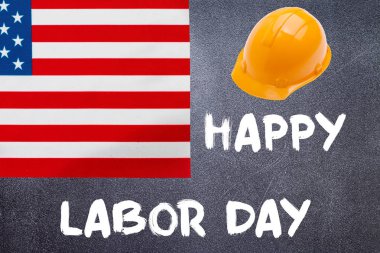 Amerika Birleşik Devletleri bayrağı ile tahta üzerinde mutlu Işgücü günü