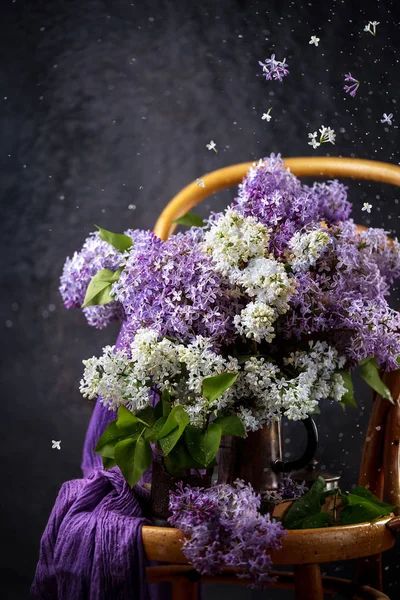 Bouquet of purple and white lilac on dark gray background — Stock Photo, Image