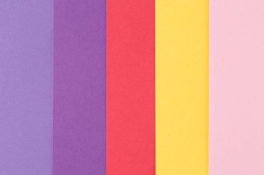 Farklı renklerde bir kağıttan çok renkli arka plan, üst görünüm