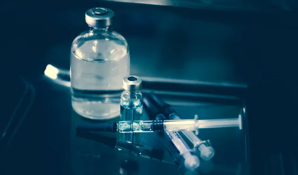 Aşı Coronavirus deverlopment şişe doz grip iğne şırıngası, tıbbi konsept enjeksiyon enjeksiyon enjeksiyonu hastalık tedavi tedavisi hastane aşı önleme hastalığı.