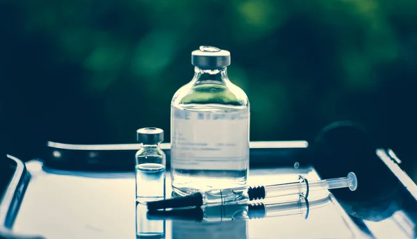 Aşı Coronavirus deverlopment şişe doz grip iğne şırıngası, tıbbi konsept enjeksiyon enjeksiyon enjeksiyonu hastalık tedavi tedavisi hastane aşı önleme hastalığı.