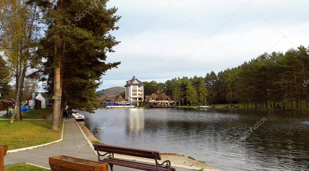 lake and pine-trees in Zlatibor - town in Serbia / October 2018