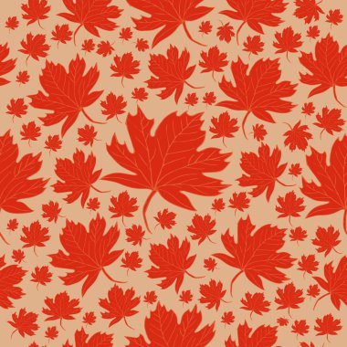 Krem rengi arka planda turuncu akçaağaç yaprakları.