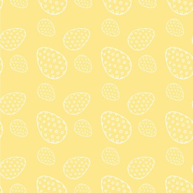 Sarı renk desenli, beyaz daireler şeklinde boyanmış yumurtalar.