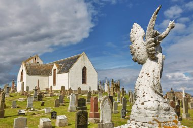 Canisbay kilisesinde mezarlık, İskoç anada en kuzeydeki kilise, John O'Groats yakınlarındaki.