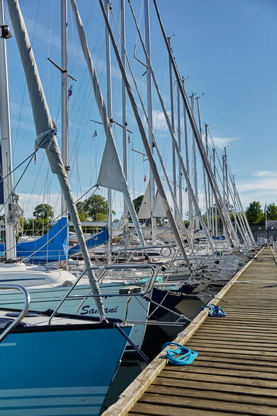 Luxury speedboats docked along side of wooden promenade at Danish capital of Copenhagen.