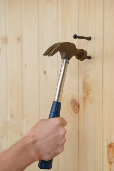 Man Hand Hammer Hammers Dowel Wooden Wall — Stock Photo, Image