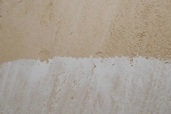 Uma parede com gesso gesso gesso gesso parcialmente rebocada — Fotografia de Stock