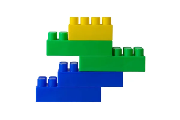 Blue-green-yellow figure from blocks of the children's plastic d — Stock Photo, Image