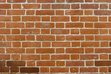 Kırmızı tuğlalardan yapılmış eski tuğla duvar