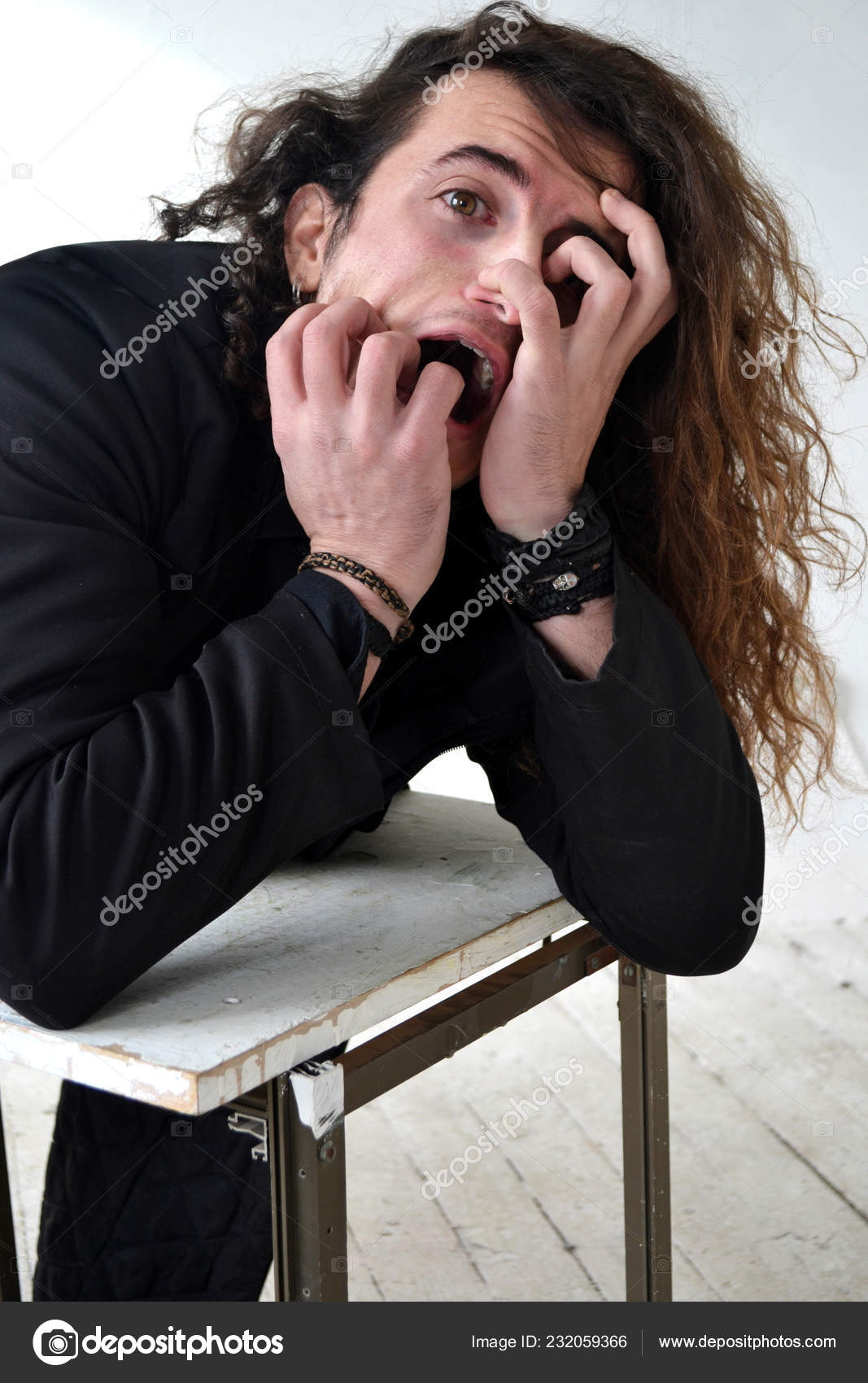 Portrait Expressive Guy Actor Long Curly Hair Black Clothes Posing