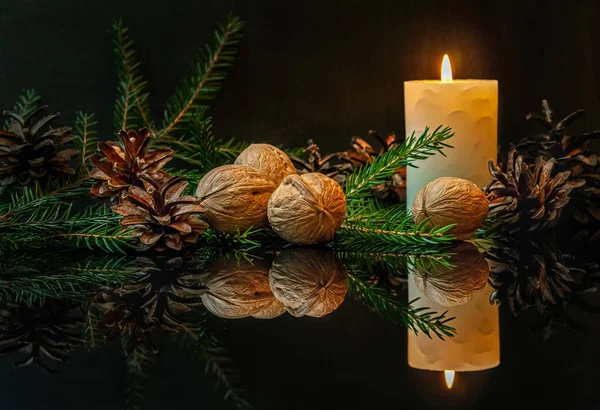 Christmas Still Life Burning Candle Fir Branches Pine Cones Walnuts — Stock Photo, Image