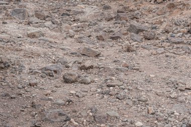 Kuru zemindeki çakıl taşlarının soyut arkaplanı