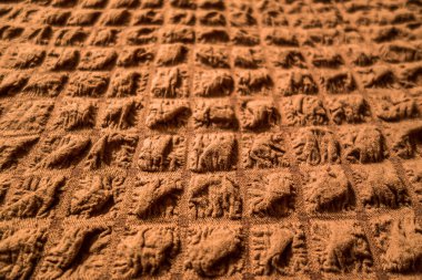 volume textile imitation bloated quilted fabric light brown close up