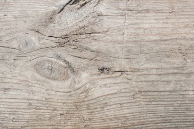 Eski ahşap tahtanın soyut arkaplanı ve belirgin bir yapısı var.