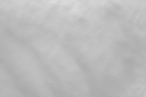 abstract background of white leather for furniture upholstery close up