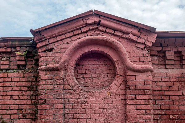 old brick wall in neo-gothic style
