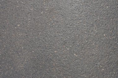 Islak asfalt dokusunun soyut arkaplanı