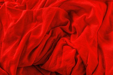 Eski kırmızı örgü kumaşın soyut arkaplanı