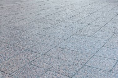 Granit kiremitlerle kaplı bir kaplamanın soyut arkaplanı 