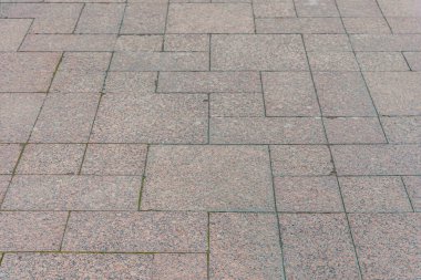 Granit kiremitlerle kaplı bir kaplamanın soyut arkaplanı 