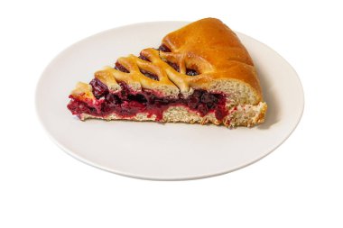 Beyaz seramik tabakta ev yapımı vişneli turta.