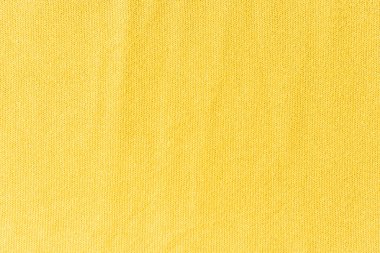 Eski sarı örgü kumaşın soyut arkaplanı