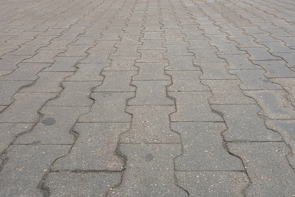 Parktaki pistteki fayansların soyut arkaplanı kapat