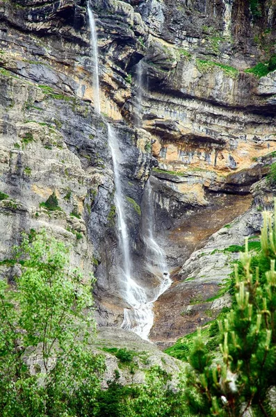 Mountains and waterfalls in the Monte Perdido alley in Ordesa National Park in Spain.