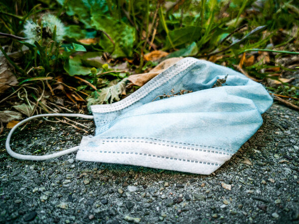 Surgical masks in nature. Corona virus pollution. Leherheide, Bremerhaven.