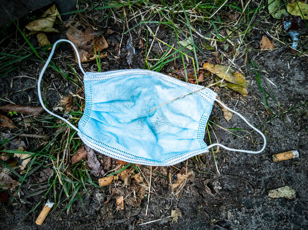 Surgical masks in nature. Corona virus pollution. Leherheide, Bremerhaven.