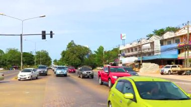 Khon Kaen Province Isan Thailand 07. November 2018 Busy city life cityscape people buildings cars heavy traffic jam rush hour panorama view on street road highway in Khon Kaen District Isan Thailand.