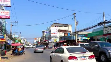Khon Kaen Province Isan Thailand 03. November 2018 Busy city life cityscape people buildings cars heavy traffic jam rush hour panorama view on street road highway in Khon Kaen District Isan Thailand.