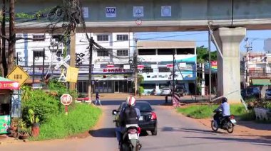 Khon Kaen Province Isan Thailand 01. November 2018 The train arrives and the road street is closed with a railway barrier and cars are stopped in Khon Kaen Northeast Thailand in Southeast Asia.
