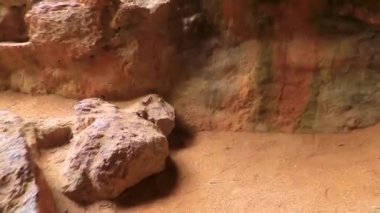 Takua Thung Phang Nga Thailand 12. June 2018 People tourists in cave limestone rock rocks cave cliff and cliffs mountain seascape and beach on the James Bond Island Khao Phing Kan in Krasom Thailand.