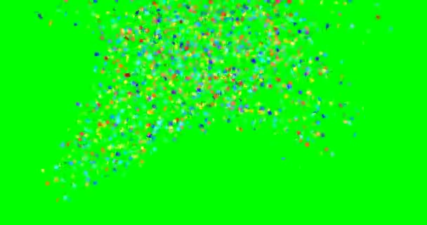 Confetti partito Popper esplosioni su un verde  . — Video Stock