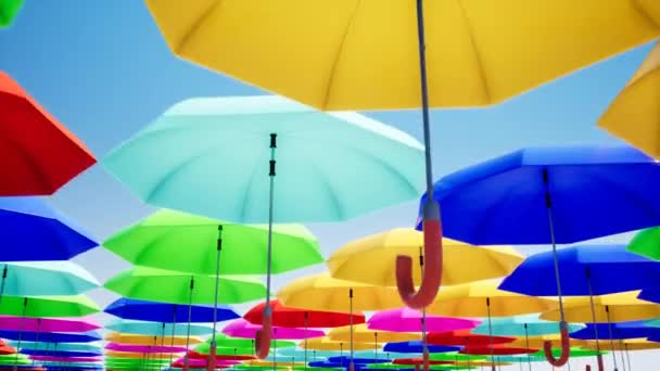 Kleurrijke paraplu's opknoping in de lucht — Stockvideo