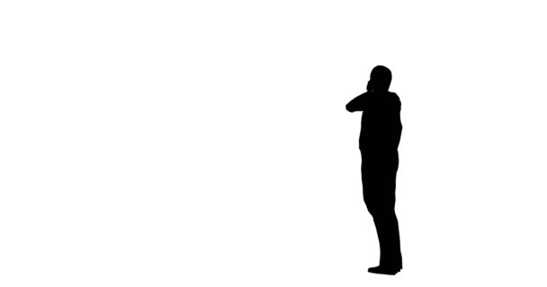 Silhouette of a man stands on a white background — Stock Video