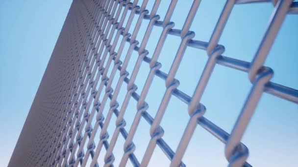 Metal wire mesh against a blue sky — Stock Video