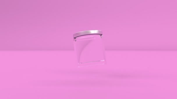 Przezroczysty szklany kosmetyk pusty słoik Butelka powoli obraca się w powietrzu na różowym minimalistycznym okładce materiał niekończąca się animacja — Wideo stockowe