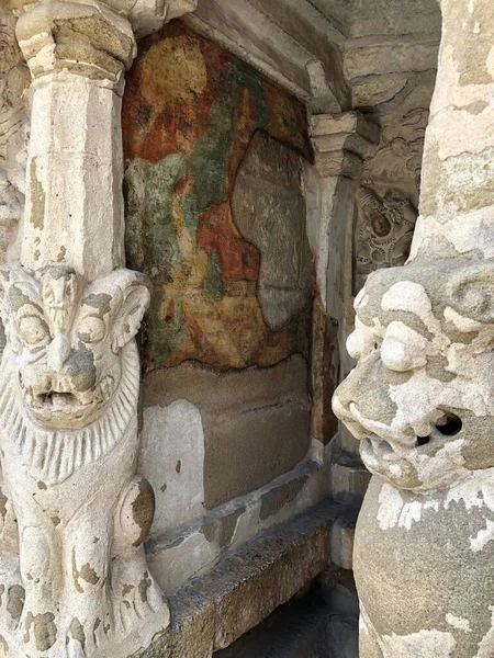 Sandstone sculptures of God and lions are carved prominently as a idols in the ancient kanchi kailasanathar temple in kancheepuram