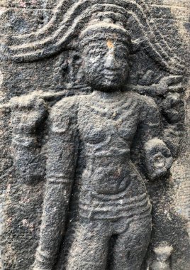 Tamil Nadu 'daki Shiva Tapınağı' nın taş duvarlarına Hindu Tanrısı 'nın kabartma heykeli oyulmuş.