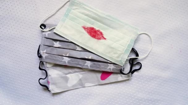 Top View Handmade Protective Mask Red Lipstick Lips Imprint Mask — стоковое видео