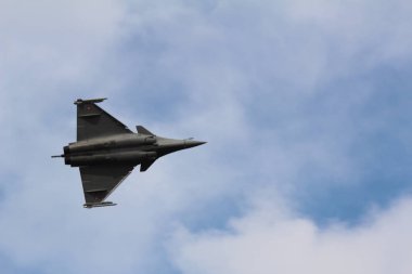 The plane in flight flies sideways