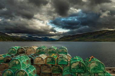 Lobster Pods In The Harbor Of Ullapool At Loch Broom In Scotland clipart