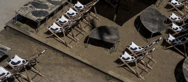 Abandoned Beach Bar With Empty Deck Chairs During Corona Crisis