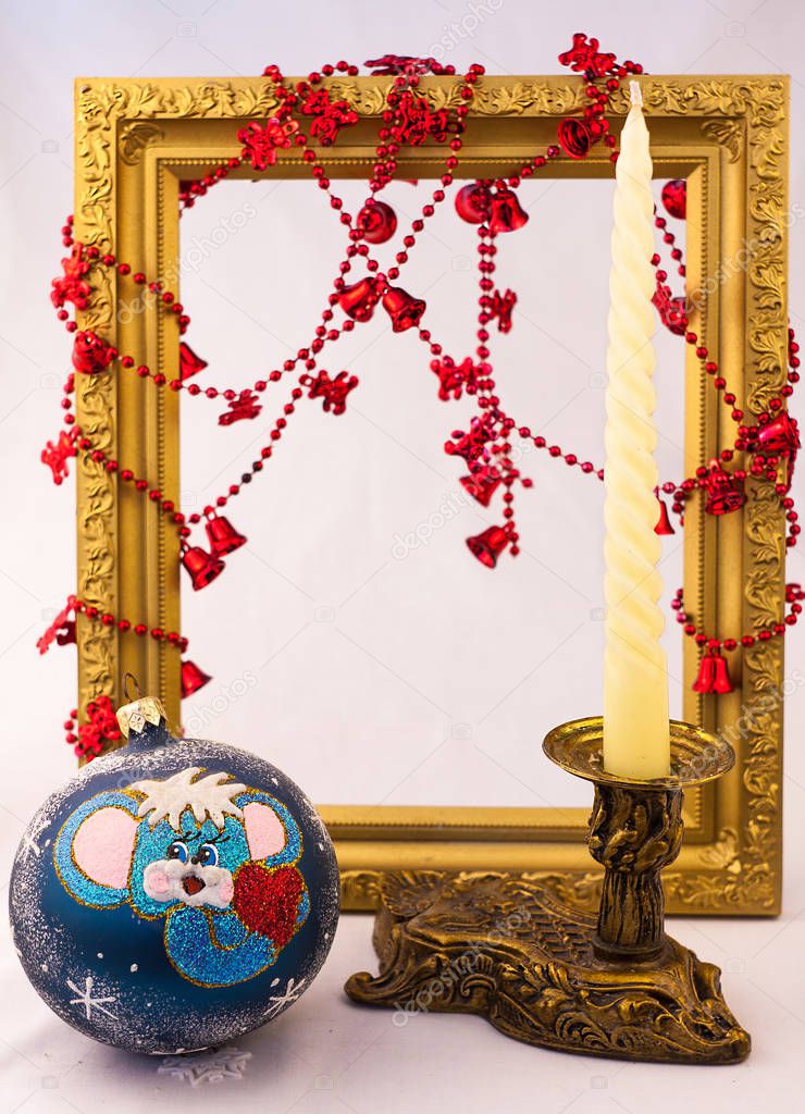Photo, Christmas card, free space for text and images, Christmas frame with a candle.Christmas ball.