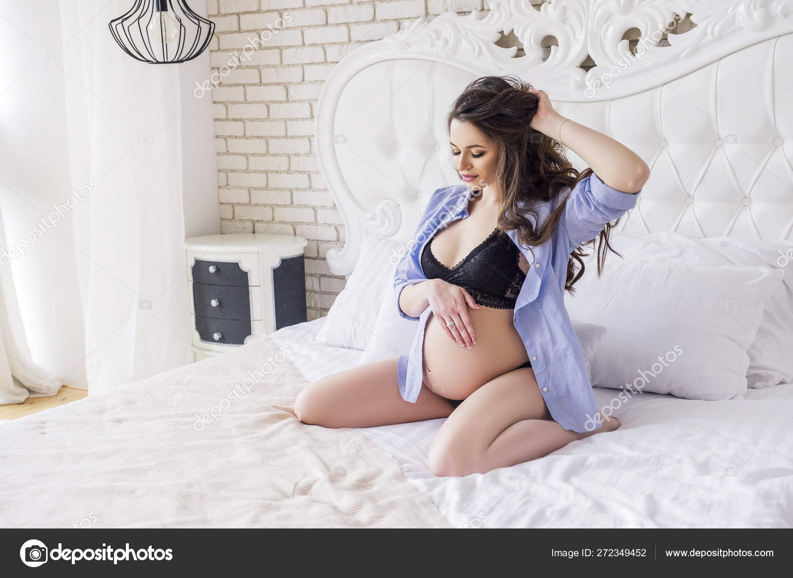 Gorgeous brunette pregnant woman at home in sexy lingerie Stock Photo by ©Annademy 272349452 photo